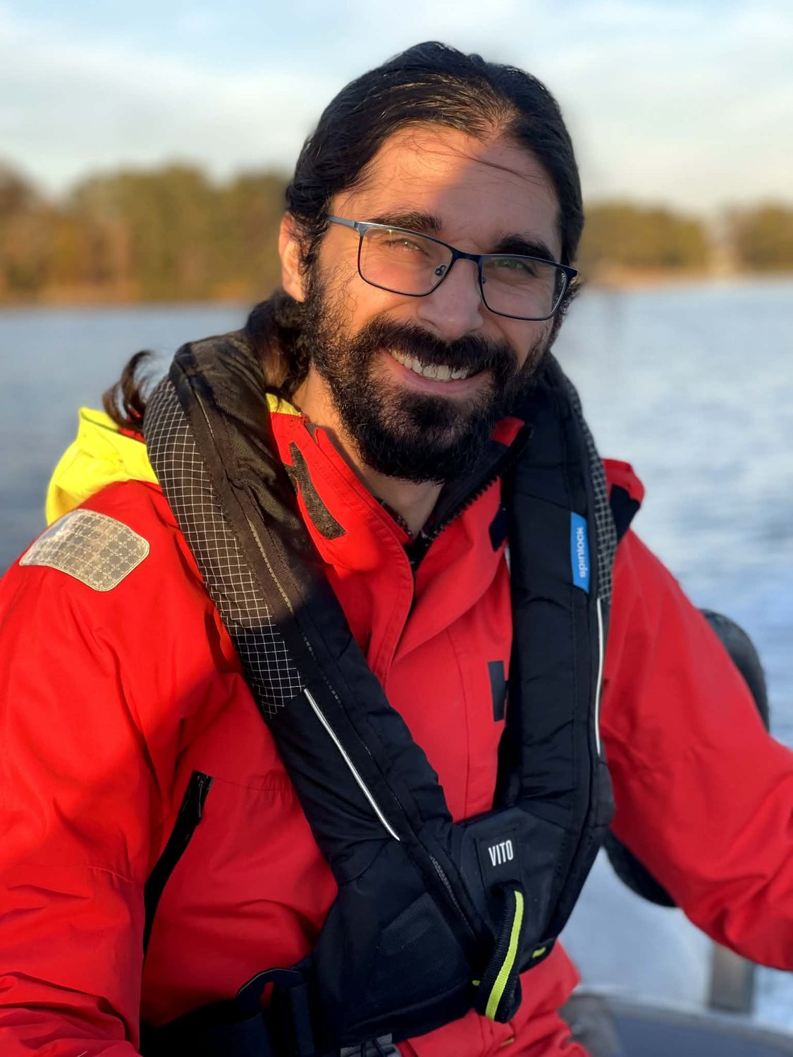 Ozan Duran on the water wearing a life jacket